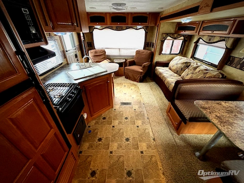 2010 Keystone Cougar X-Lite 27RLS RV Photo 2