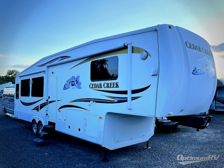 2011 Forest River Cedar Creek 34RLSA RV Photo 1