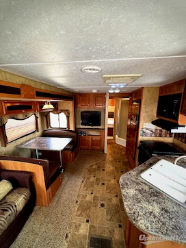 2010 Keystone Cougar X-Lite 27RLS RV Photo 2
